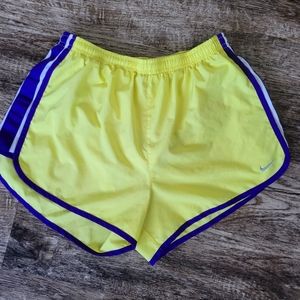 Womens nike athletic shorts, yellow and purple, size medium GUC